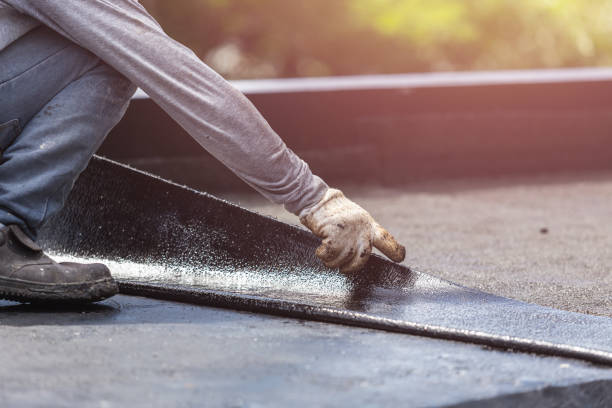 Professional Emergency Waterproofing technician working in Columbia City, IN